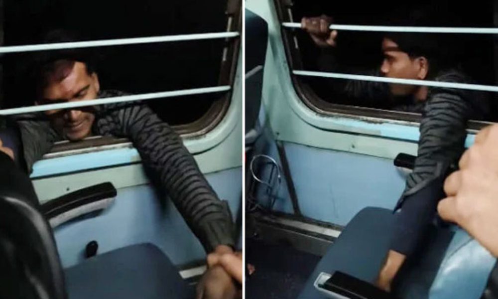 Man Hangs from Moving Train to Steal Goods, Viral Video Sparks Outrage Pulse news network